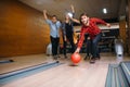 Male bowler throws ball on lane, strike shot Royalty Free Stock Photo