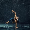 The male break dancer in water. Royalty Free Stock Photo