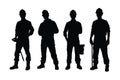 Male bricklayers wearing uniforms silhouette set vector on a white background. Mason standing in different positions silhouette Royalty Free Stock Photo