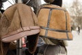 Male brown decorated winter hats on rack Royalty Free Stock Photo