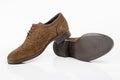 Male brown leather shoes on white background Royalty Free Stock Photo