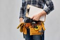 Male builder with clipboard and working tools Royalty Free Stock Photo