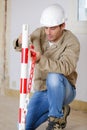 male builder fitting chains Royalty Free Stock Photo