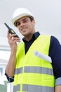 Male builder in hardhat with walkie talkie Royalty Free Stock Photo