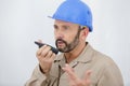 male builder in hardhat with walkie talkie Royalty Free Stock Photo