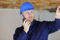 male builder in hardhat with walkie talkie Royalty Free Stock Photo