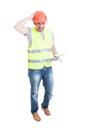 Male builder with tablet looking confused or doubtful Royalty Free Stock Photo