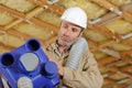 Male builder working with pipes Royalty Free Stock Photo