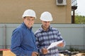 Male Building Engineers Visiting Construction Site