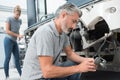 Male bus mechanic at work Royalty Free Stock Photo