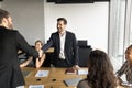 Male business partners shaking hands after successful negotiation Royalty Free Stock Photo