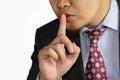 Male businessman finger mouth shh gesture Royalty Free Stock Photo