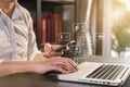 Male businessman working with smart phone and laptop and digital tablet computer at home office. Royalty Free Stock Photo