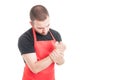 Male butcher having wrist pain Royalty Free Stock Photo