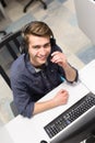 Male call centre operator doing his job top view Royalty Free Stock Photo