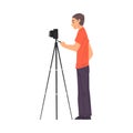 Male Cameraman Shooting with Camera on Tripod, Videographer with Professional Equipment Cartoon Vector Illustration