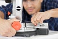 Male carpenter fixin circular saw Royalty Free Stock Photo