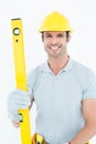 Male carpenter holding spirit level Royalty Free Stock Photo