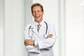 Male caucasian doctor is laughing. Royalty Free Stock Photo