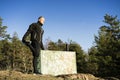 Male caucasian middle age boxer training and strething outside in nature