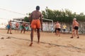 Male Caucasians, Arabs, Africans playing volleyball on the beach at sunset. Egypt. Hurghada. Golden 5 October 7, 2016 Royalty Free Stock Photo