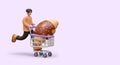 Male character is carrying giant croissant in shopping cart. Banner for bakery, confectionery