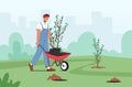 Male Character Planting Trees Seedlings to Soil in Garden, Man Move Plant on Wheelbarrow. Save World, Reforestation Royalty Free Stock Photo