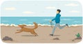 Male character running after puppy on leash on coastline. Man and dog jogging during cold season Royalty Free Stock Photo