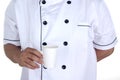 The male chef holding a papercup of coffee