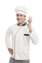 Male chef showing ok sign and smiling