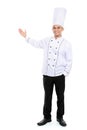 Male chef smiling presenting blank space