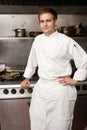 Male Chef Standing Next To Cooker