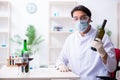 Male chemist examining wine samples at lab Royalty Free Stock Photo