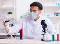 Male chemist examining wine samples at lab Royalty Free Stock Photo