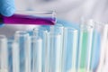 A male chemist holds test tube of glass Royalty Free Stock Photo