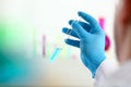 A male chemist holds test tube of glass in Royalty Free Stock Photo