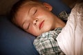 Male child sleeping in bed