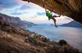 Male climber climbing overhanging rock Royalty Free Stock Photo