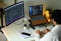 Male coders developing website design and coding technologies at modern office