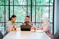 male college student and two female students using a laptop Royalty Free Stock Photo