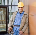 Male construction worker posing in hard-hat