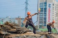 Male construction workers working at a construction site