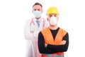Male constructor and doctor both standing with arms crossed Royalty Free Stock Photo