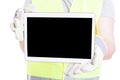 Male constructor holding tablet with empty screen