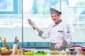 The male cook preparing food in the kitchen Royalty Free Stock Photo