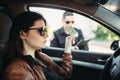 Male cop in uniform writes a fine to female driver Royalty Free Stock Photo