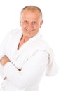 Male cosmetics - mature man in white bathrobe Royalty Free Stock Photo