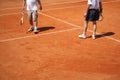 Male couple playing tennis