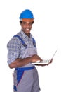 Male craftsman holding laptop