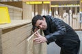 Male customer choosing flakeboard or Oriented strand board Royalty Free Stock Photo